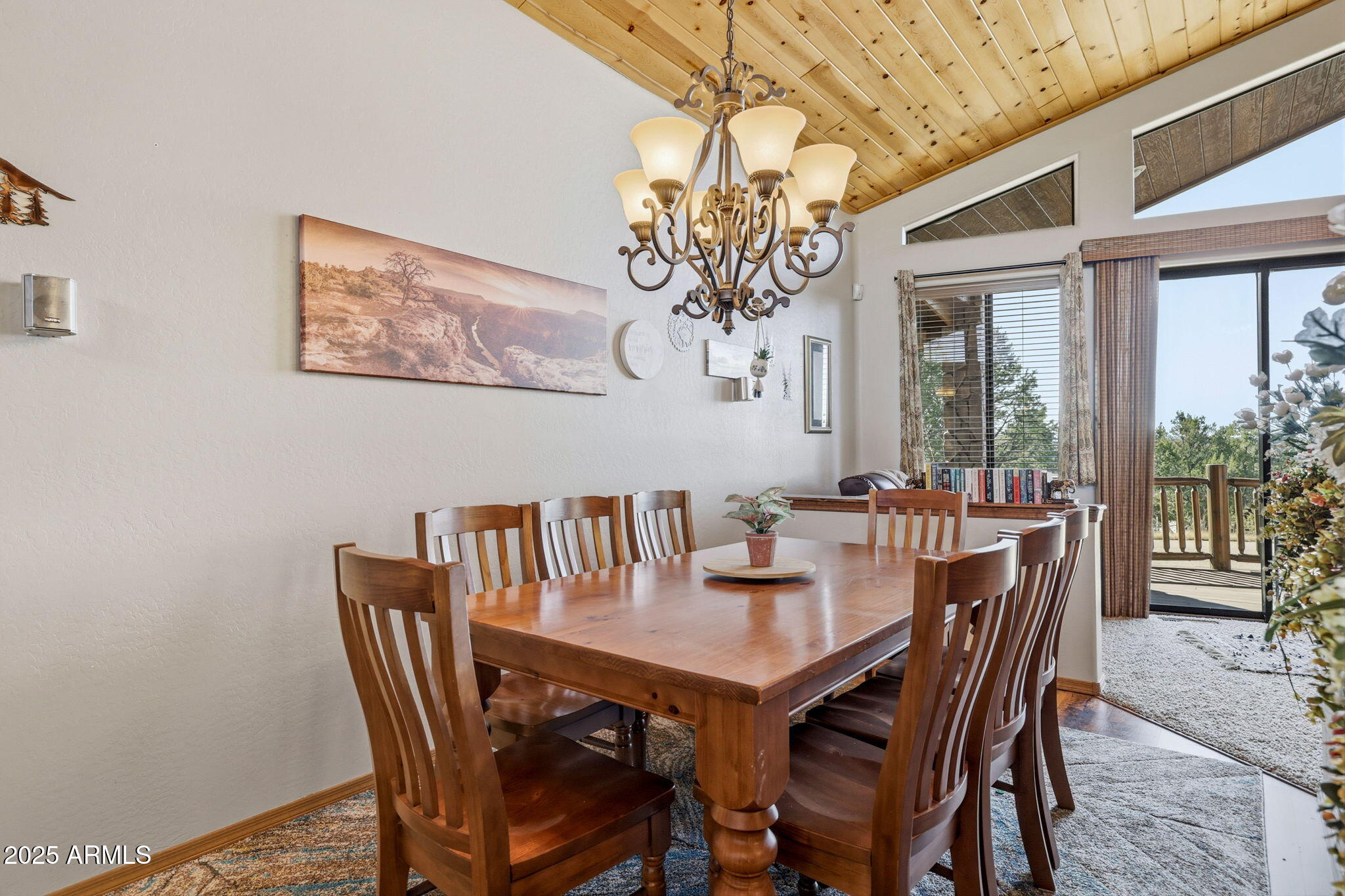 2276 Thunderbird Way Overgaard, AZ 85933 - Photo 12 of 41 a view of a dining room with furniture window and outside view