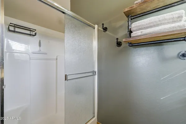 a view of a room with racks on the wall