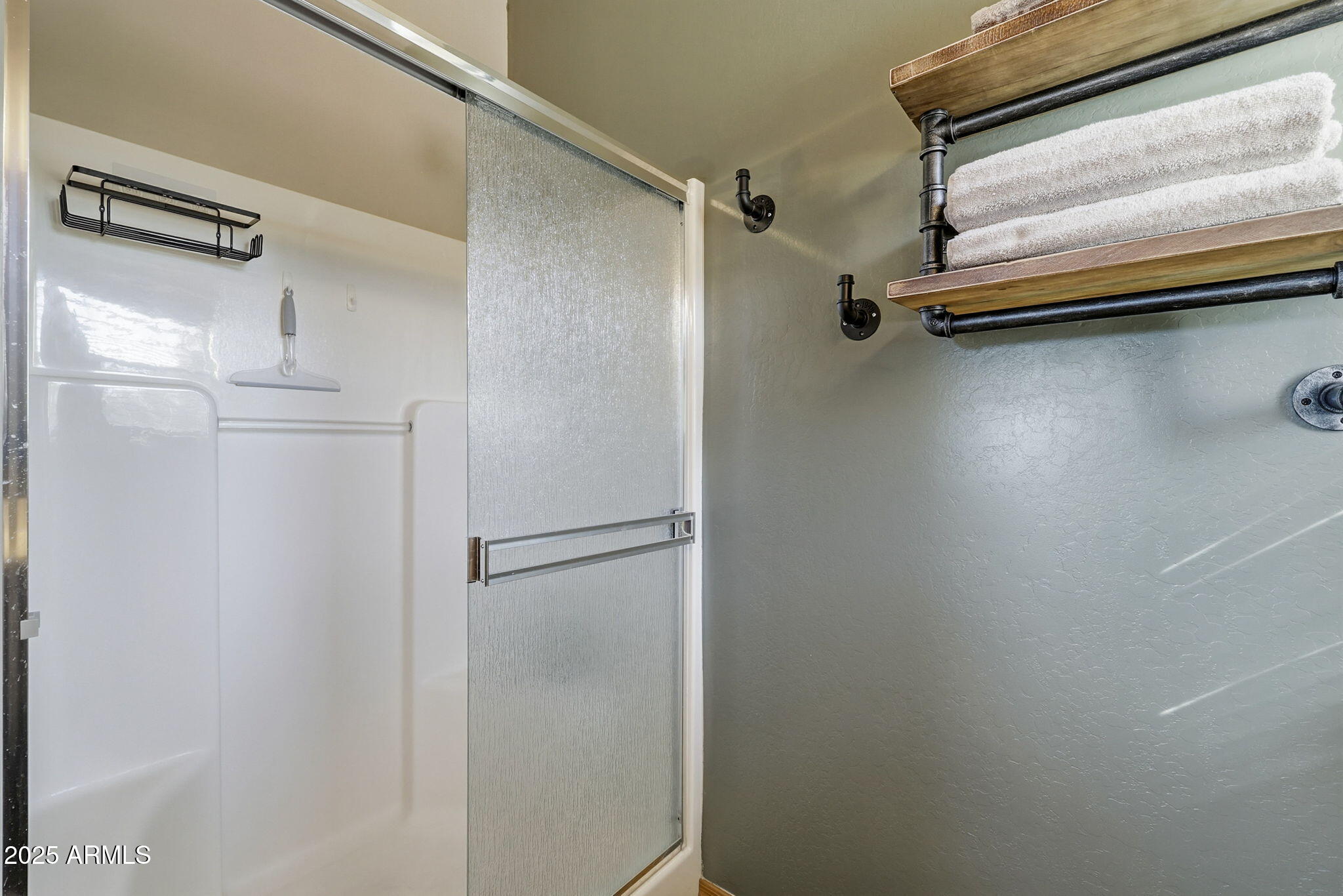 2276 Thunderbird Way Overgaard, AZ 85933 - Photo 26 of 41 a view of a room with racks on the wall