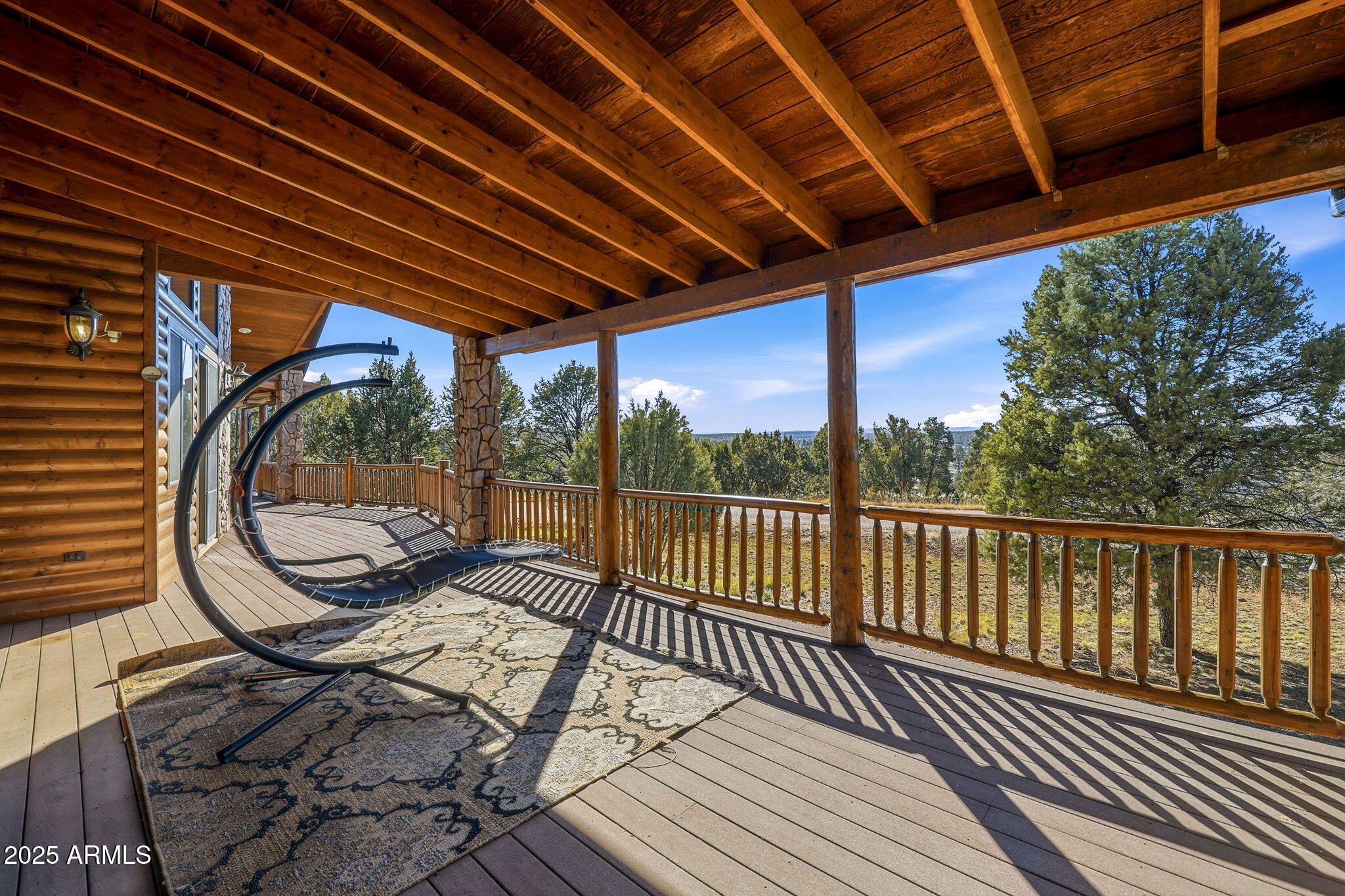 2276 Thunderbird Way Overgaard, AZ 85933 - Photo 35 of 41 a view of a balcony with wooden floor
