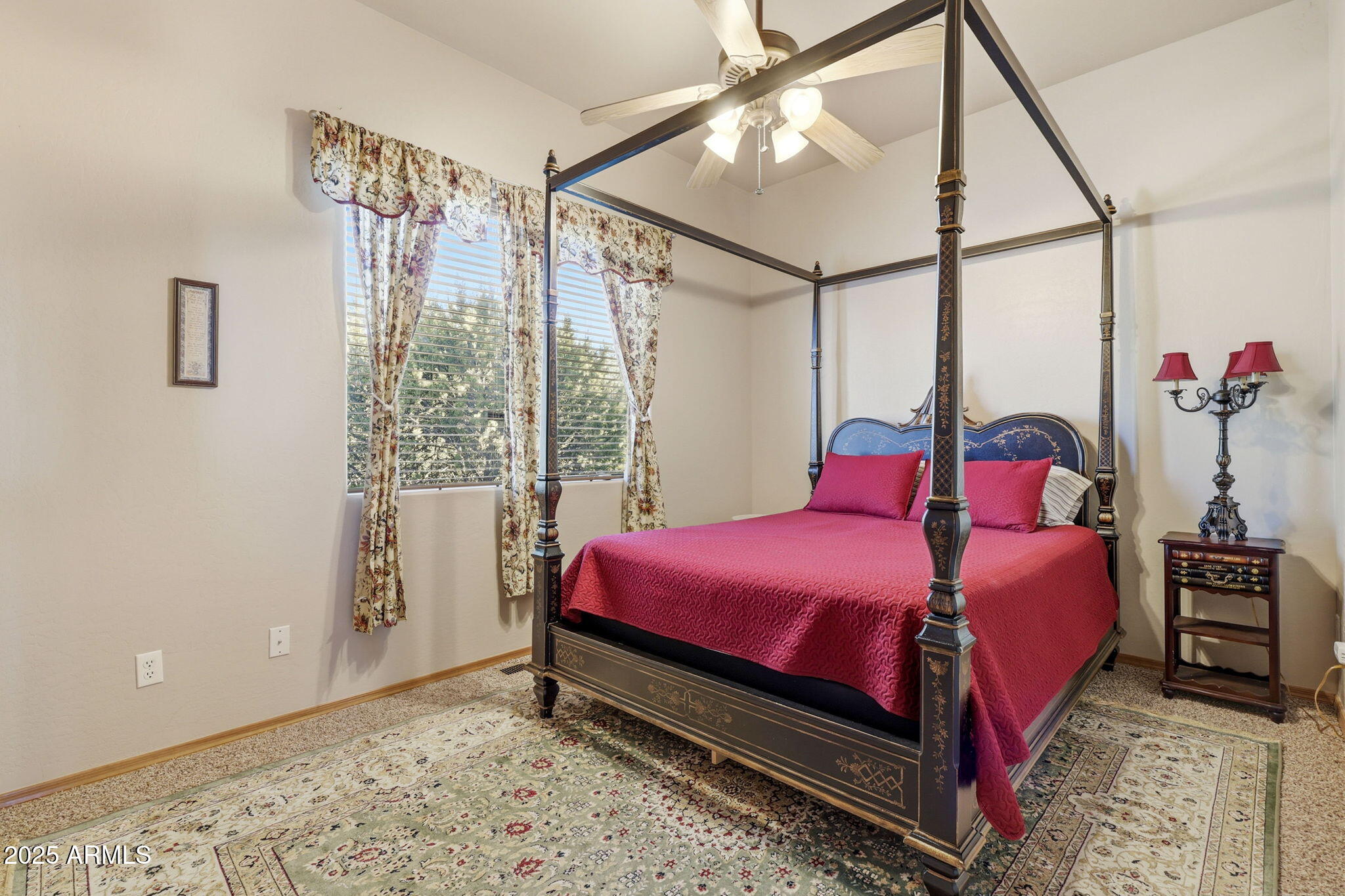 2276 Thunderbird Way Overgaard, AZ 85933 - Photo 39 of 41 a bedroom with a bed and a window
