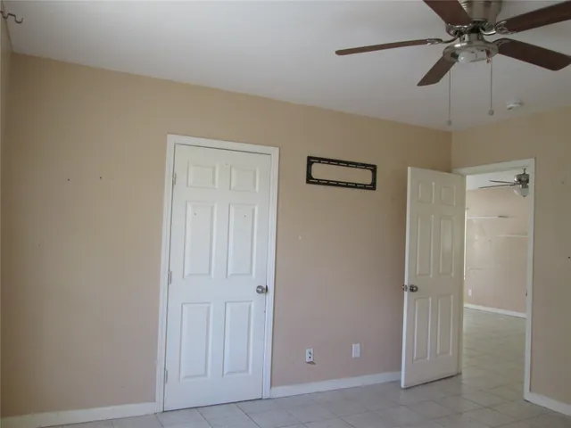 a bathroom with a shower and a toilet