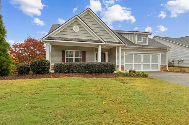 a house view with a garden space
