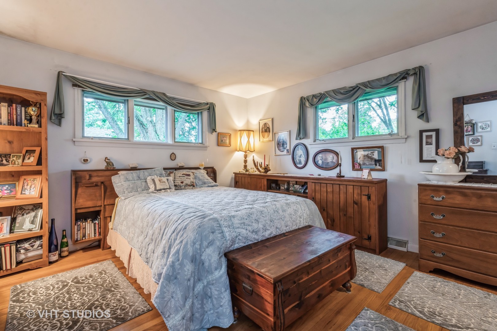 16 Aldine Road Lake Zurich, IL 60047 - Photo 10 of 24 a bed room with a bed window and book shelf