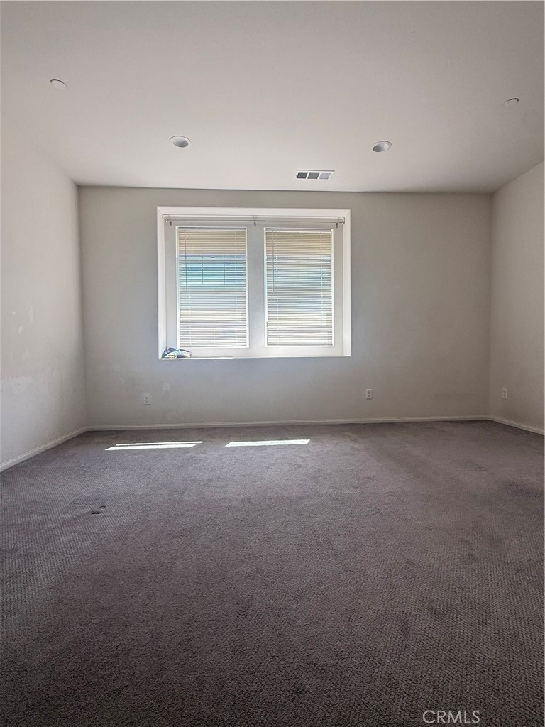 7400 Solstice Place Rancho Cucamonga, CA 91739 - Photo 13 of 22 a view of an empty room with a window
