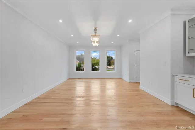 a kitchen with a sink a stove and oven