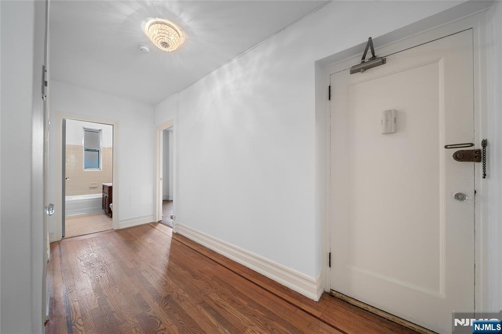 100 East Palisade Avenue, Unit B51 Englewood, NJ 07631 - Photo 13 of 37 a view of a room with wooden floor