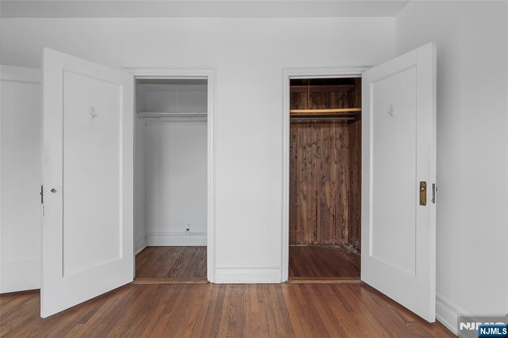100 East Palisade Avenue, Unit B51 Englewood, NJ 07631 - Photo 20 of 37 an empty room with wooden floor and closet
