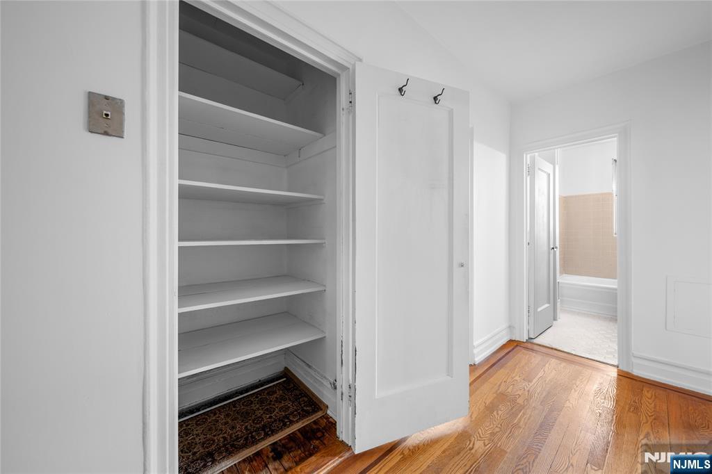 100 East Palisade Avenue, Unit B51 Englewood, NJ 07631 - Photo 25 of 37 a view of walk in closet with empty racks