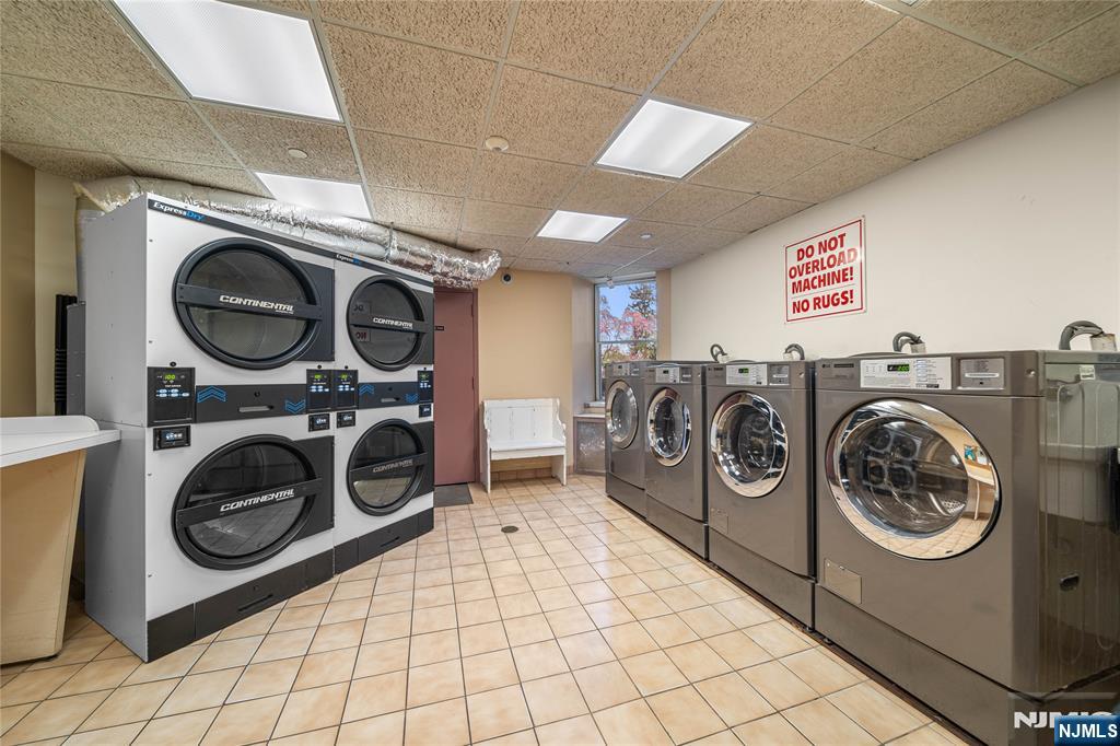 100 East Palisade Avenue, Unit B51 Englewood, NJ 07631 - Photo 26 of 37 a utility room with dryer and washer