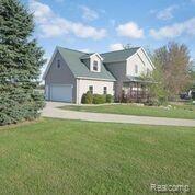 9055 North Nicholson Road Fowlerville, MI 48836 - Photo 1 of 24 Side Entry Garage