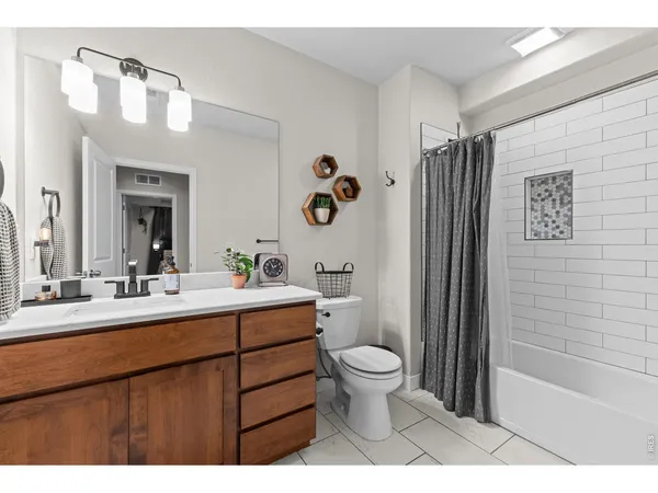 $679,900 | 825 Shirttail Peak Drive, Windsor, CO 80550