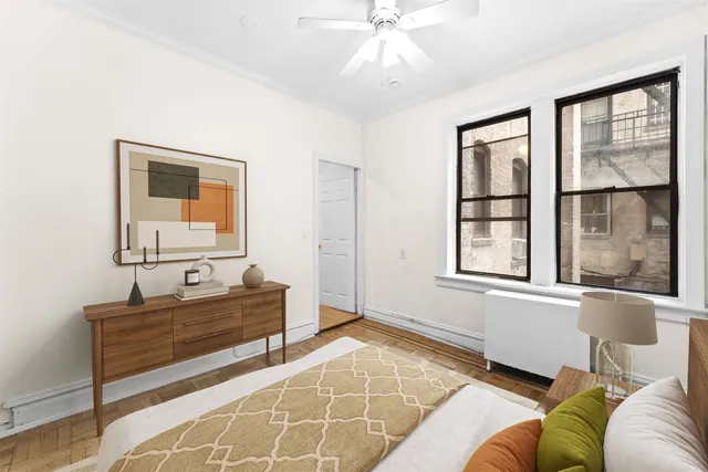 a living room with furniture and windows