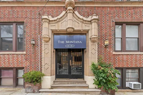 a view of a brick building with entryway