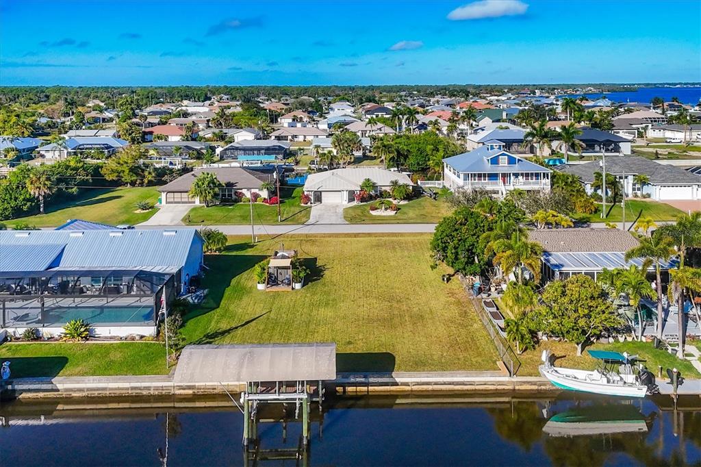 5276 Early Terrace Port Charlotte, FL 33981 - Photo 15 of 20 a view of a city with lawn chairs