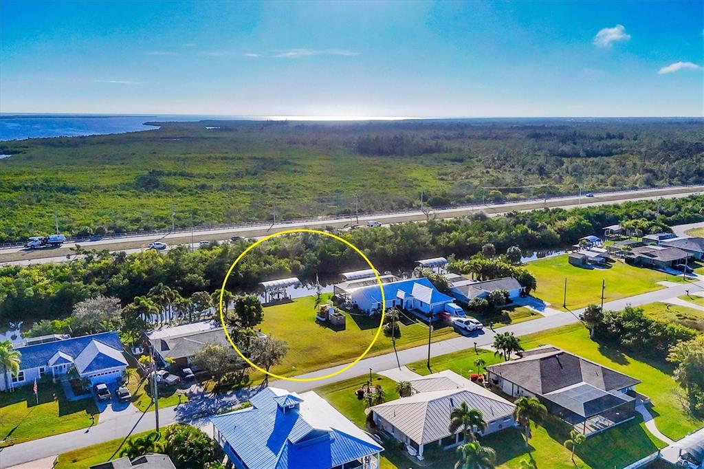 5276 Early Terrace Port Charlotte, FL 33981 - Photo 20 of 20 an aerial view of residential houses with outdoor space and swimming pool