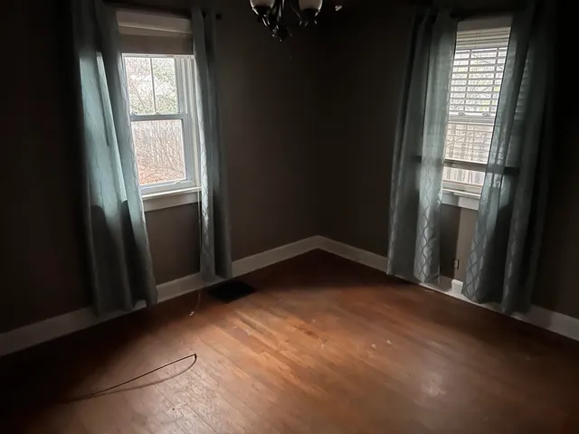 an empty room with windows