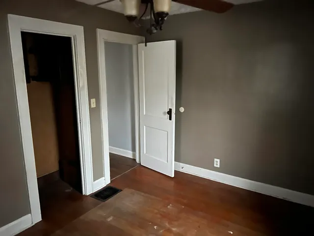 an empty room with a door