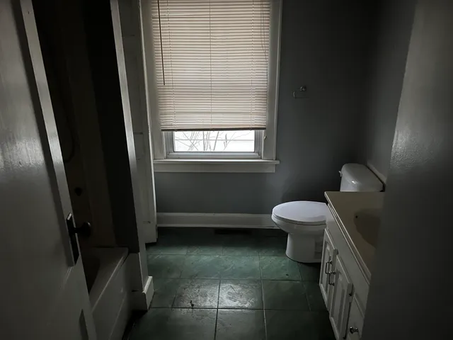 a bathroom with a toilet
