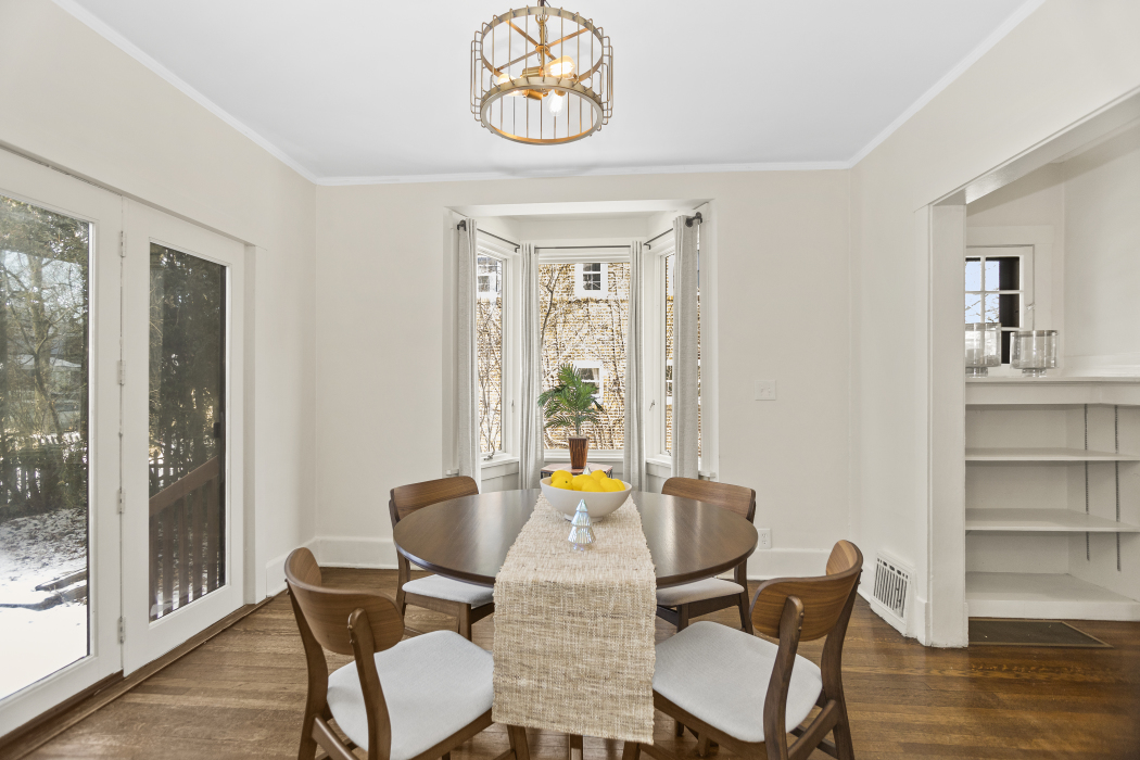Undisclosed Address Evanston, IL 60201 - Photo 11 of 39 a view of a dining room with furniture window and wooden floor