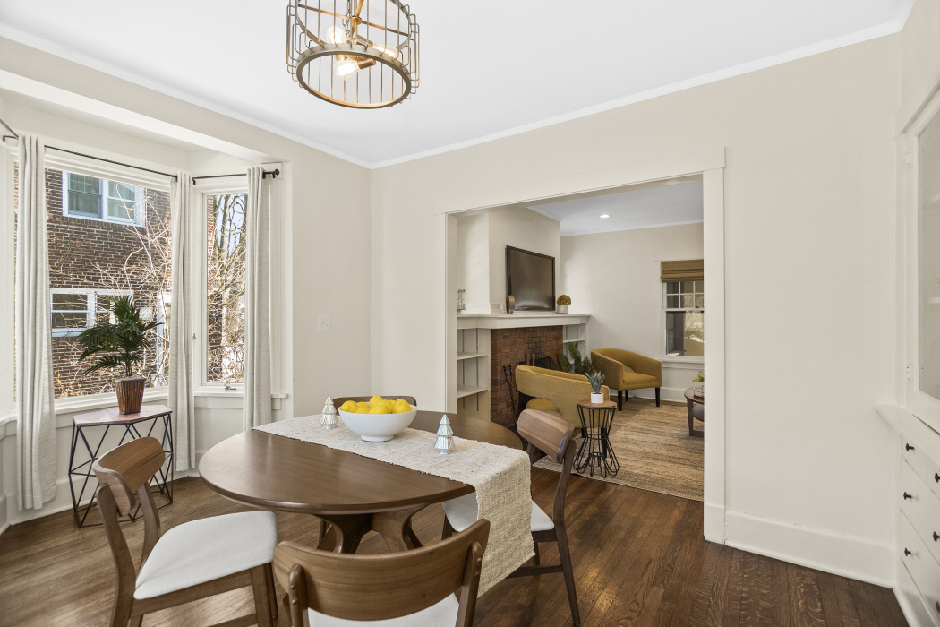 Undisclosed Address Evanston, IL 60201 - Photo 13 of 39 a view of a dining room with furniture window and wooden floor