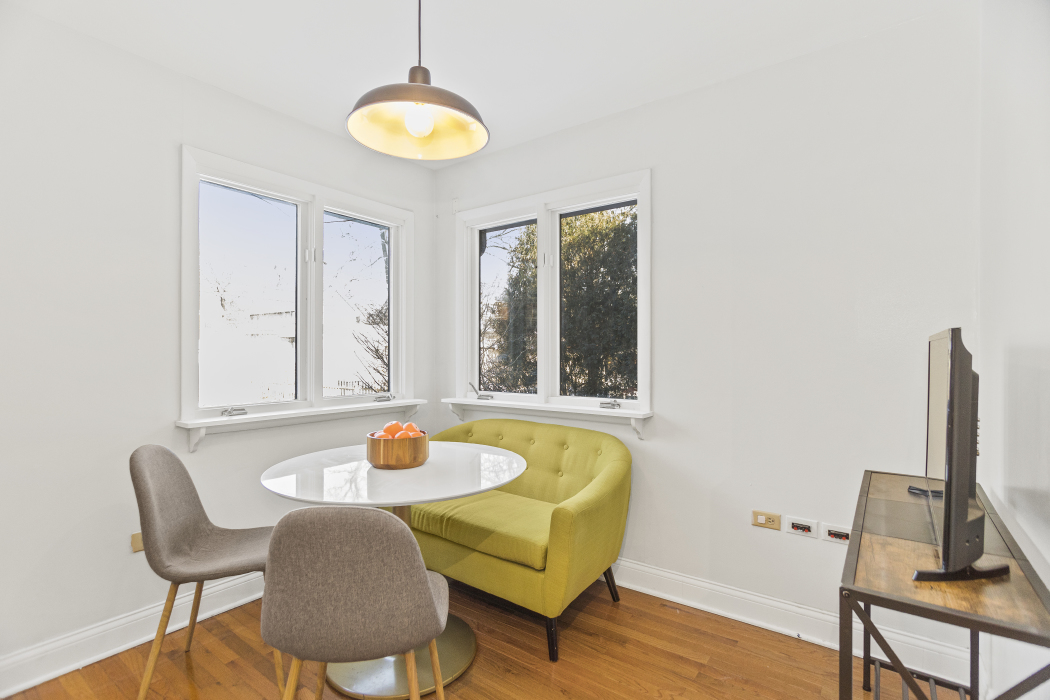 Undisclosed Address Evanston, IL 60201 - Photo 17 of 39 a living room with furniture and a window