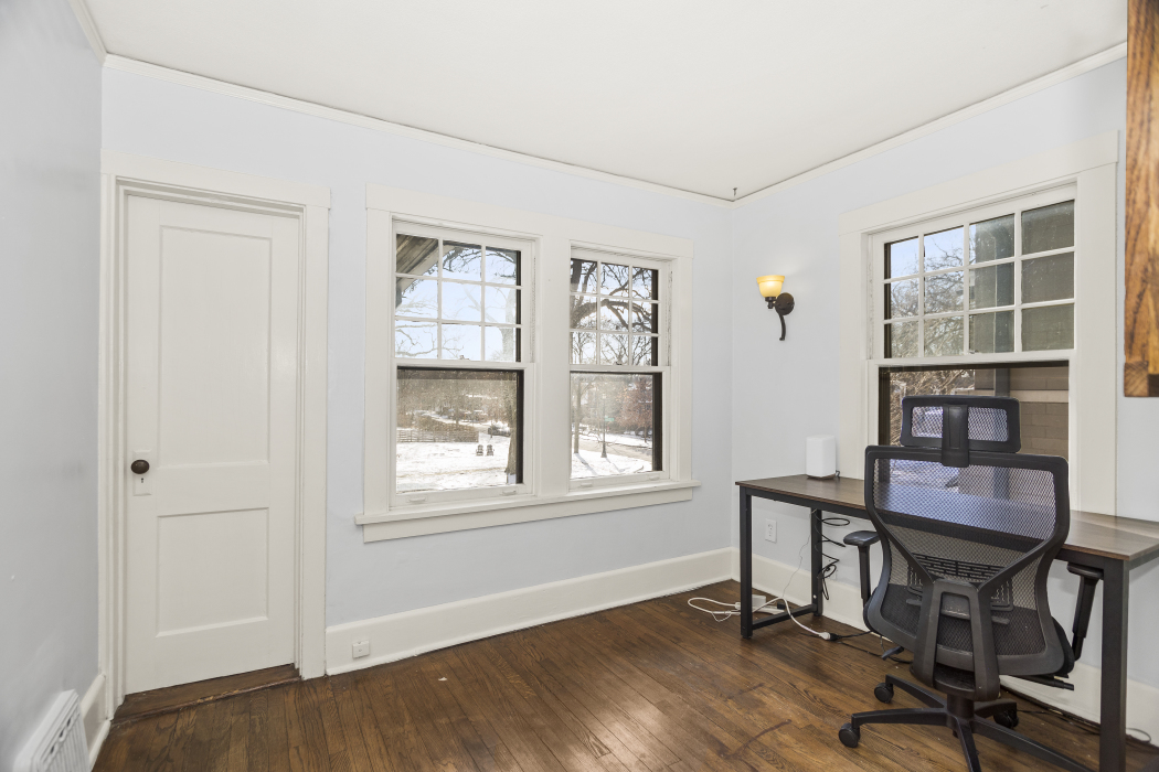 Undisclosed Address Evanston, IL 60201 - Photo 24 of 39 a view of a workspace with furniture and a window