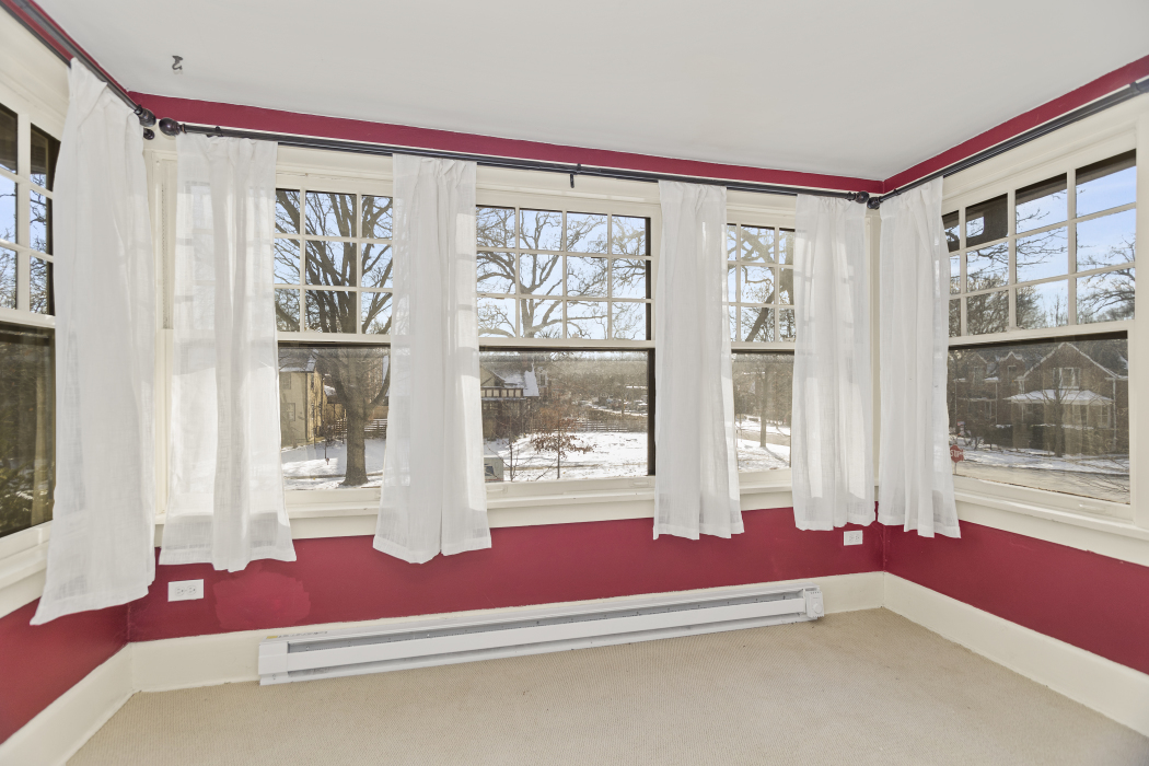 Undisclosed Address Evanston, IL 60201 - Photo 26 of 39 a living room with furniture and large windows
