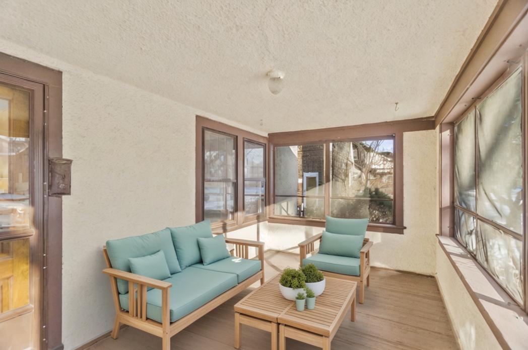 Undisclosed Address Evanston, IL 60201 - Photo 3 of 39 a living room with furniture and a large window