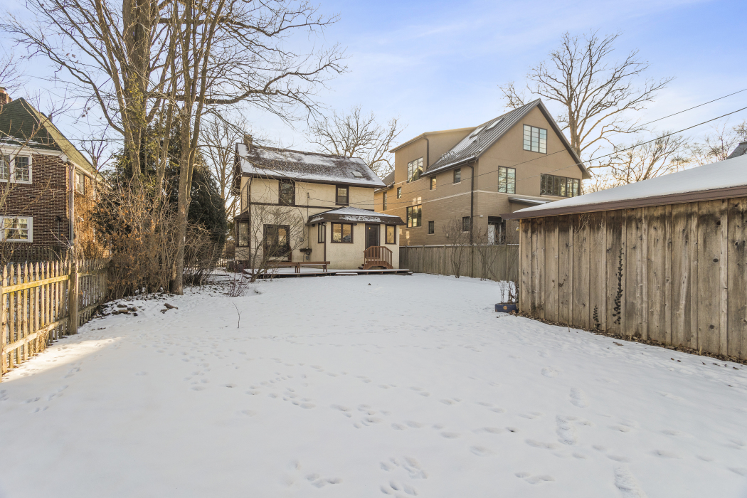 Undisclosed Address Evanston, IL 60201 - Photo 31 of 39 a view of a house with a snow in the yard