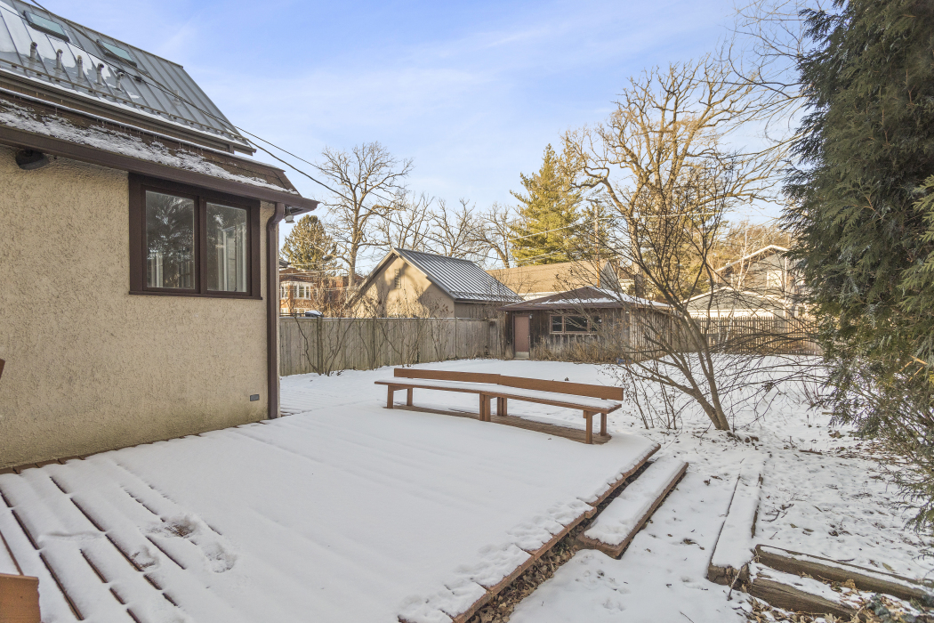Undisclosed Address Evanston, IL 60201 - Photo 34 of 39 a bench sitting in front of a building