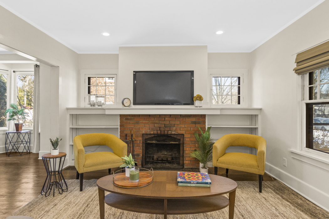 Undisclosed Address Evanston, IL 60201 - Photo 7 of 39 a living room with furniture and a fireplace
