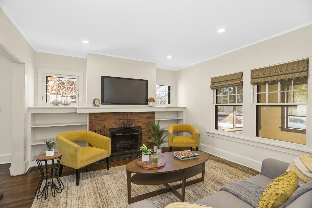 Undisclosed Address Evanston, IL 60201 - Photo 9 of 39 a living room with furniture fireplace and window