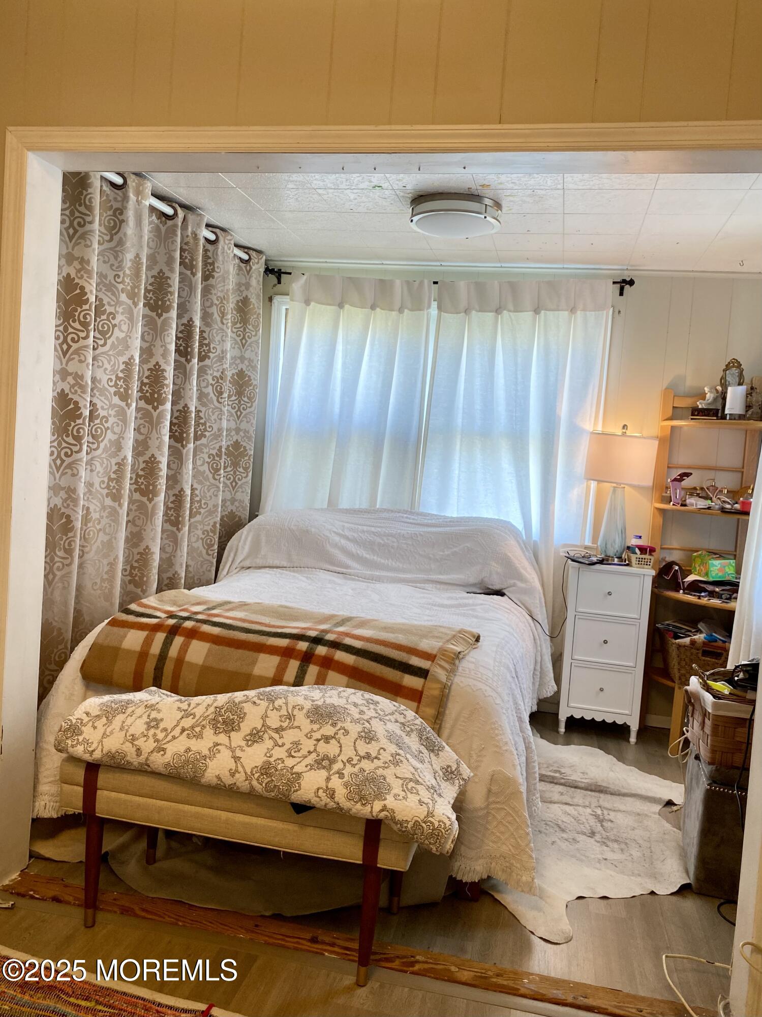 439 Mantoloking Road Brick, NJ 08723 - Photo 12 of 19 a bedroom with a bed and wooden floor