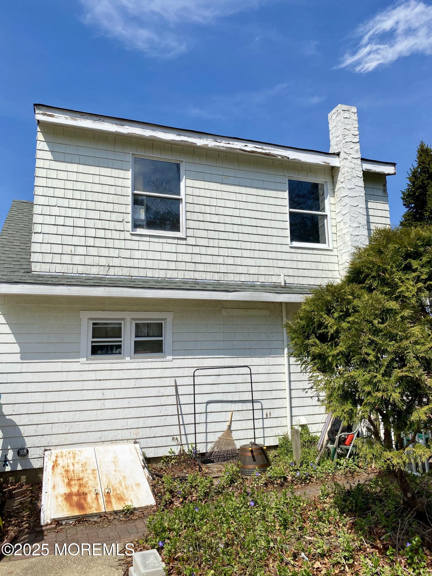 439 Mantoloking Road Brick, NJ 08723 - Photo 5 of 19 a view of a house with a yard