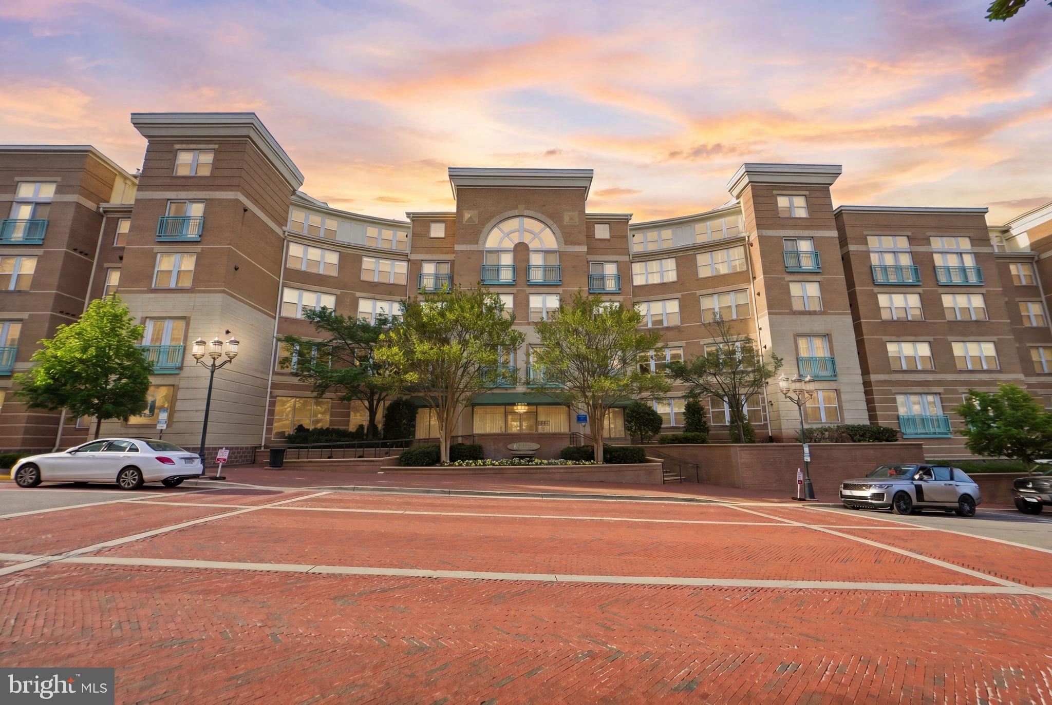 12001 Market Street, Unit 140 Reston, VA 20190 - Photo 47 of 48 Elegant urban living at sunset.