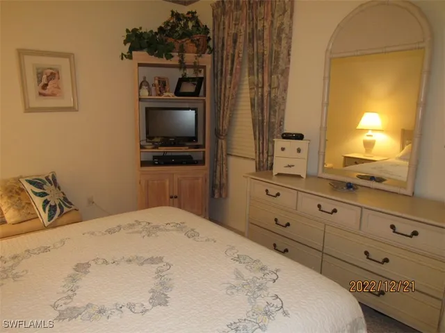 a lake view with beach and outdoor space