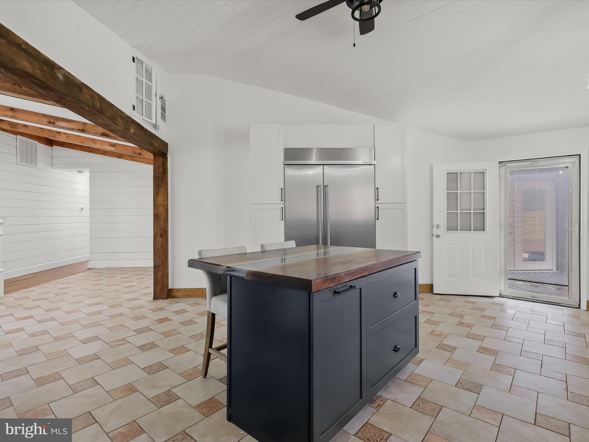 1208 Joppa Road Joppa, MD 21085 - Photo 12 of 54 a kitchen with stainless steel appliances granite countertop a sink and a refrigerator