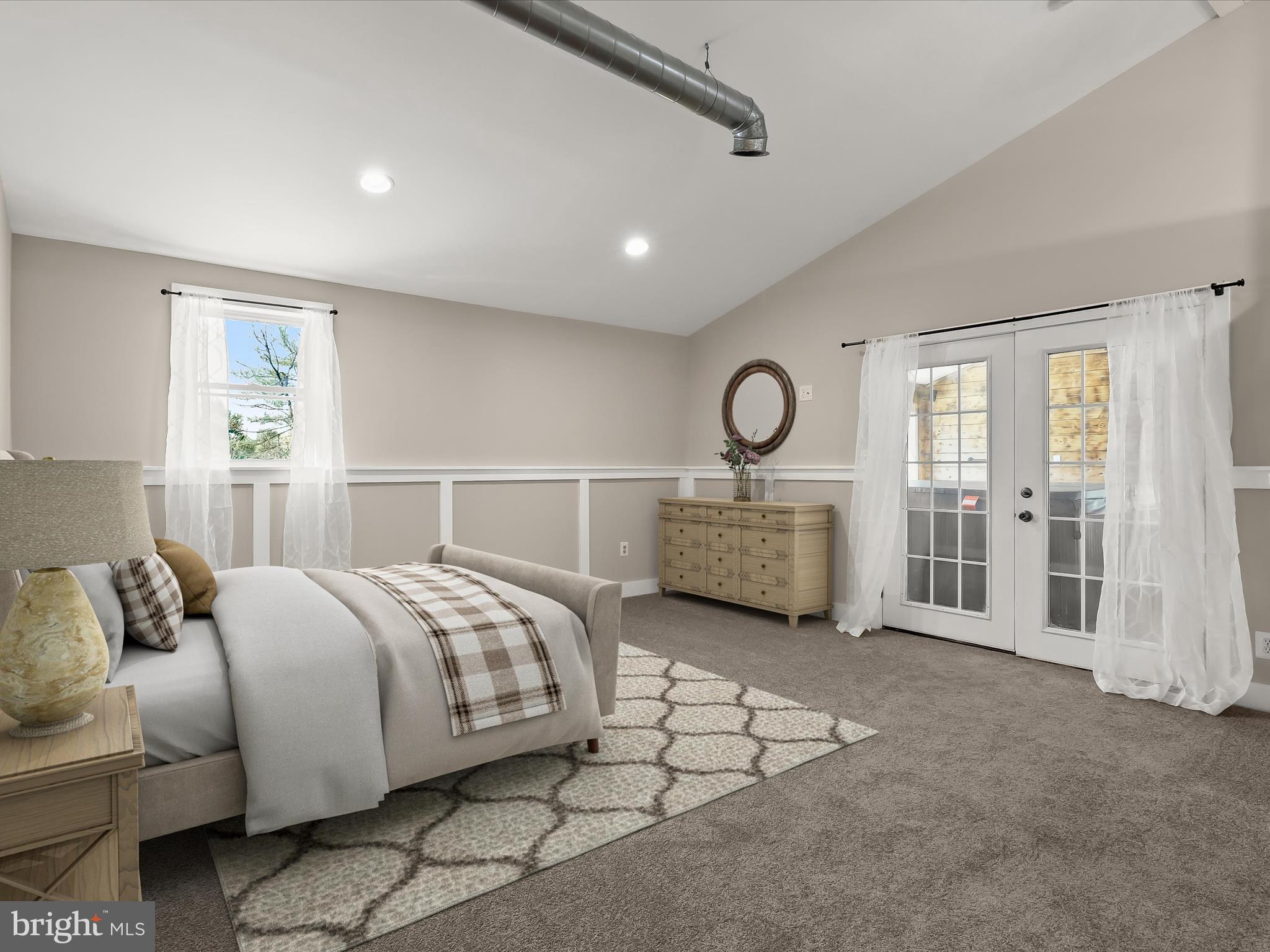 1208 Joppa Road Joppa, MD 21085 - Photo 18 of 54 a spacious bedroom with a bed a couch and a window