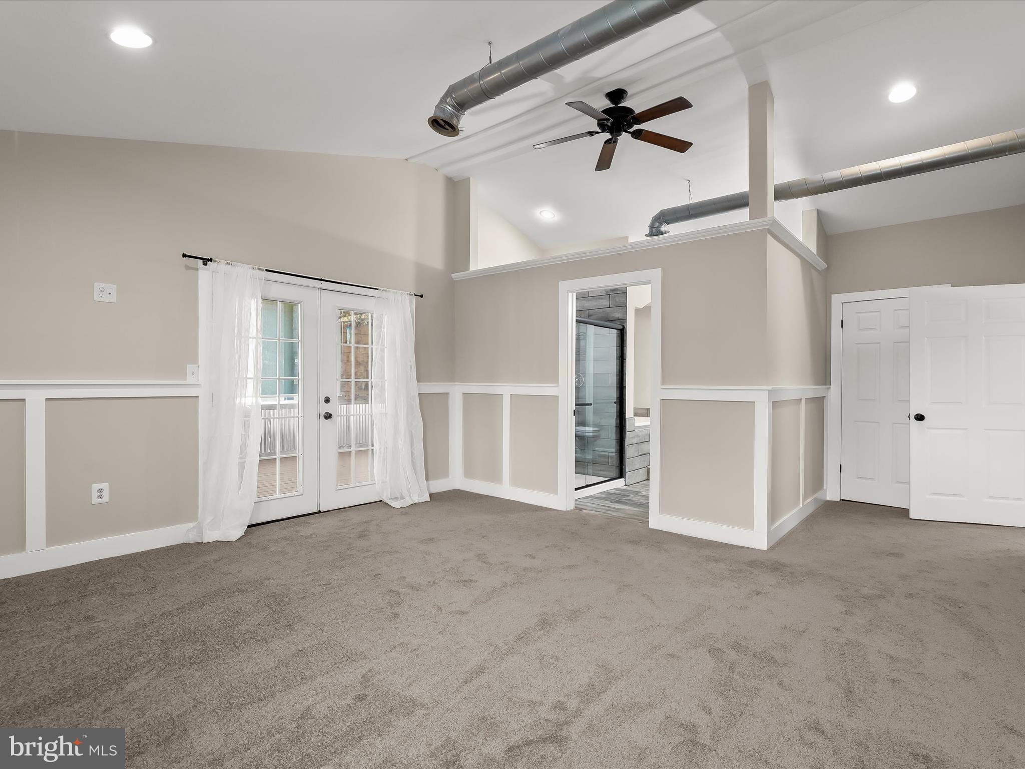 1208 Joppa Road Joppa, MD 21085 - Photo 19 of 54 a view of empty room with wooden floor and ceiling fan