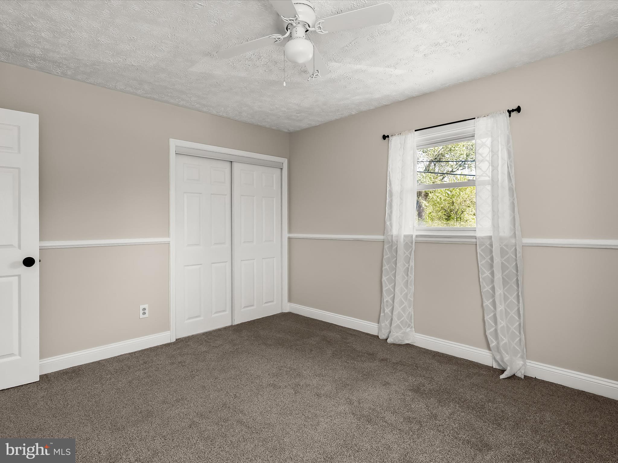 1208 Joppa Road Joppa, MD 21085 - Photo 30 of 54 an empty room with windows and closet