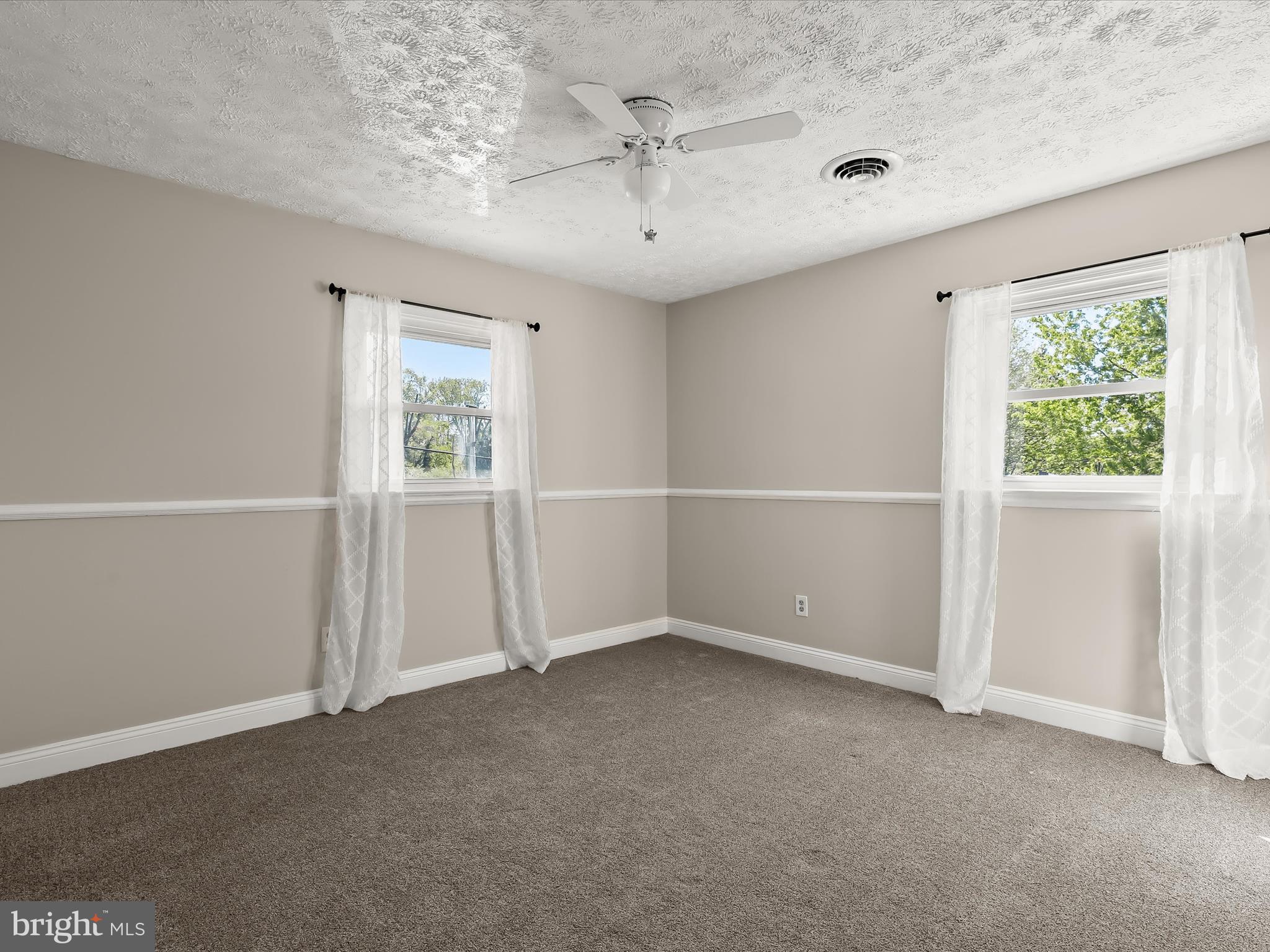 1208 Joppa Road Joppa, MD 21085 - Photo 31 of 54 an empty room with windows