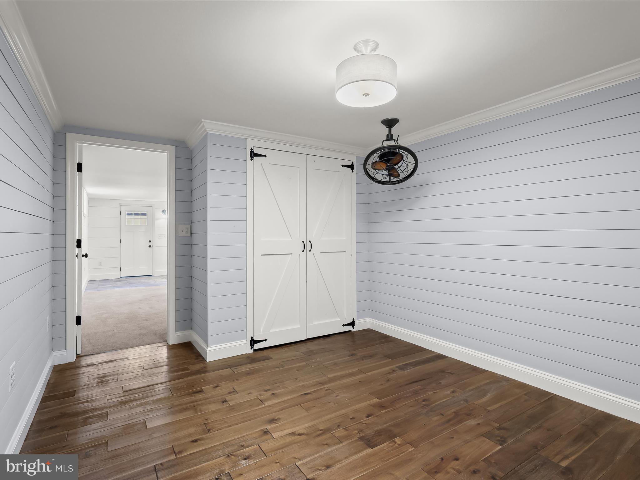 1208 Joppa Road Joppa, MD 21085 - Photo 40 of 54 a view of empty room with wooden floor