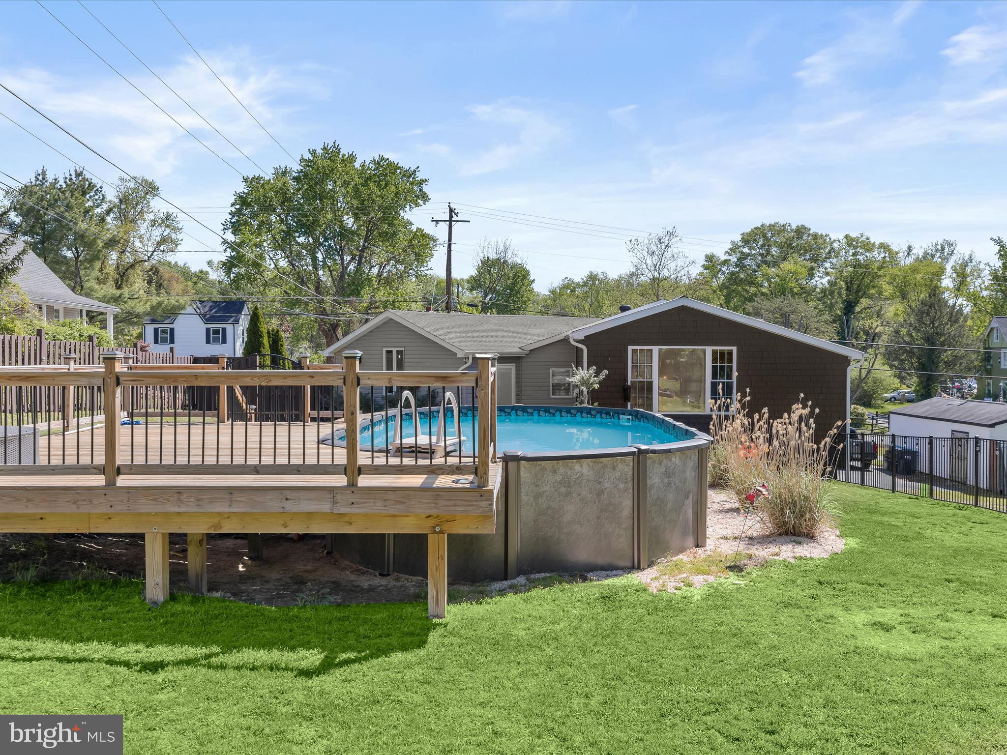 1208 Joppa Road Joppa, MD 21085 - Photo 46 of 54 a front view of house with a garden and deck
