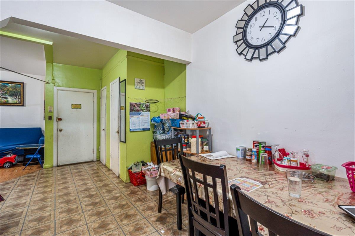 1715 St Peters Avenue Bronx, NY 10461 - Photo 23 of 30 a view of dining room with furniture and a kitchen