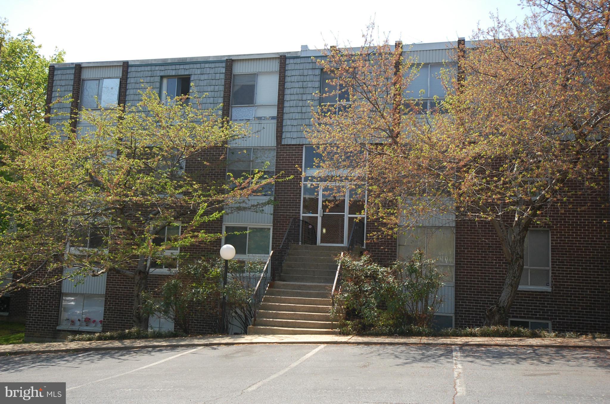 3932 Bel Pre Road, Unit 2 Silver Spring, MD 20906 - Photo 9 of 16 front view of a building
