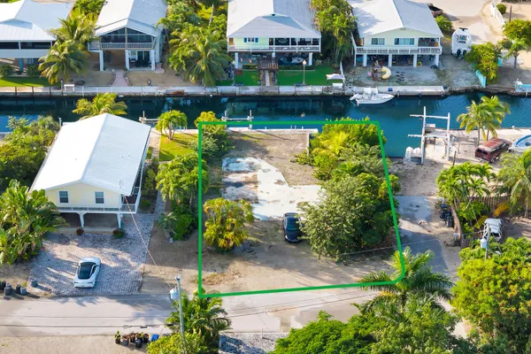 a terrace with outdoor seating and city view