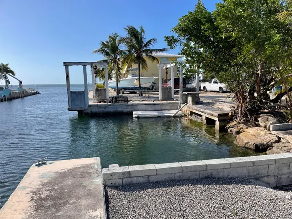 a view of a lake with a house