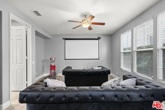 a view of a livingroom with furniture and front door