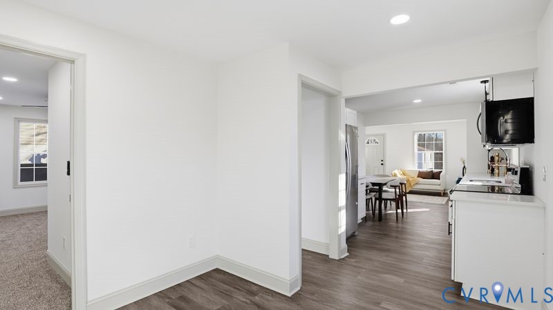 331 Walnut Street Petersburg, VA 23803 - Photo 11 of 34 a view of living room with furniture wooden floor and a flat screen tv